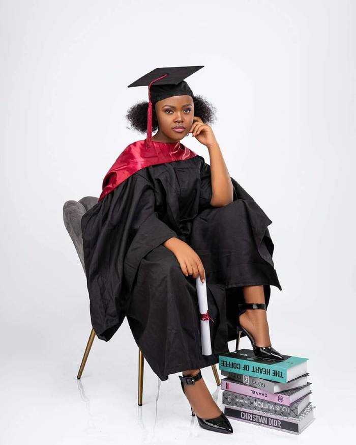 Graduation portrait, red hood