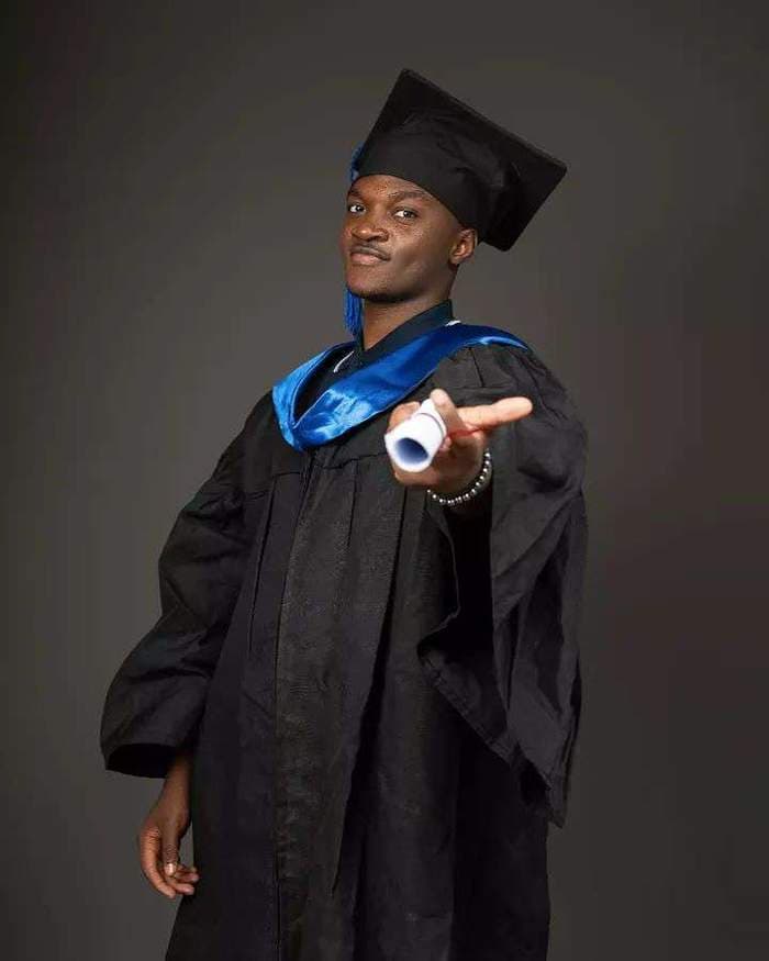 Graduation portrait, blue sash